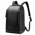 Everyday black backpack — straps and back panel