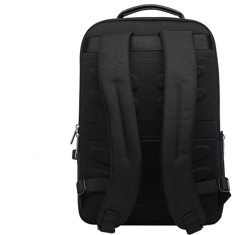 Slim black laptop backpack — side profile