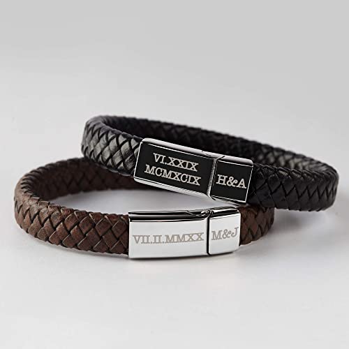 Engraved Roman numeral bracelet worn on wrist